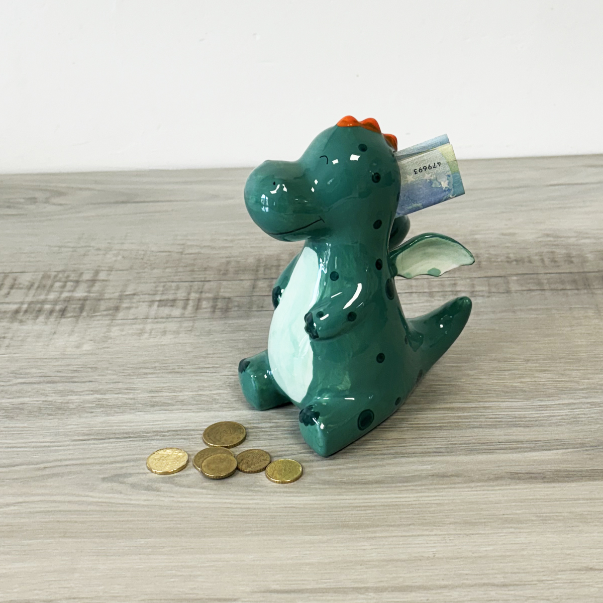 Tirelire petit dragon vert en cramique 17 cm