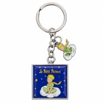 Porte-clés Le Petit Prince bleu assis sur son nuage avec charm Porte-clés Le Petit Prince bleu assis sur son nuage avec charm